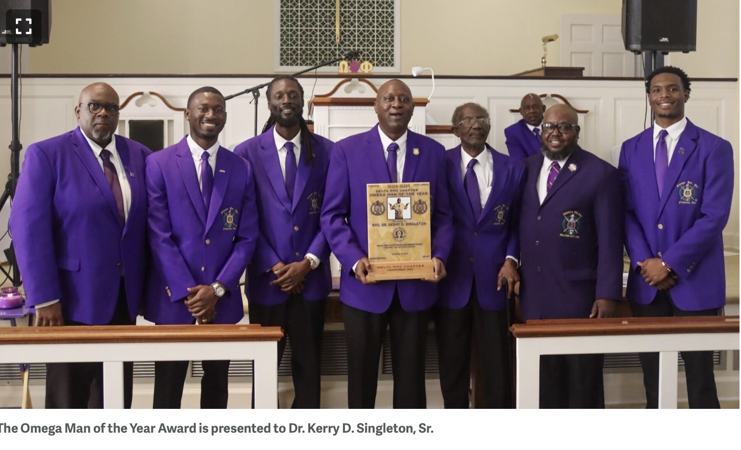 Delta Rho Chapter members recognizing Dr. Kerry D. Singleton Sr.